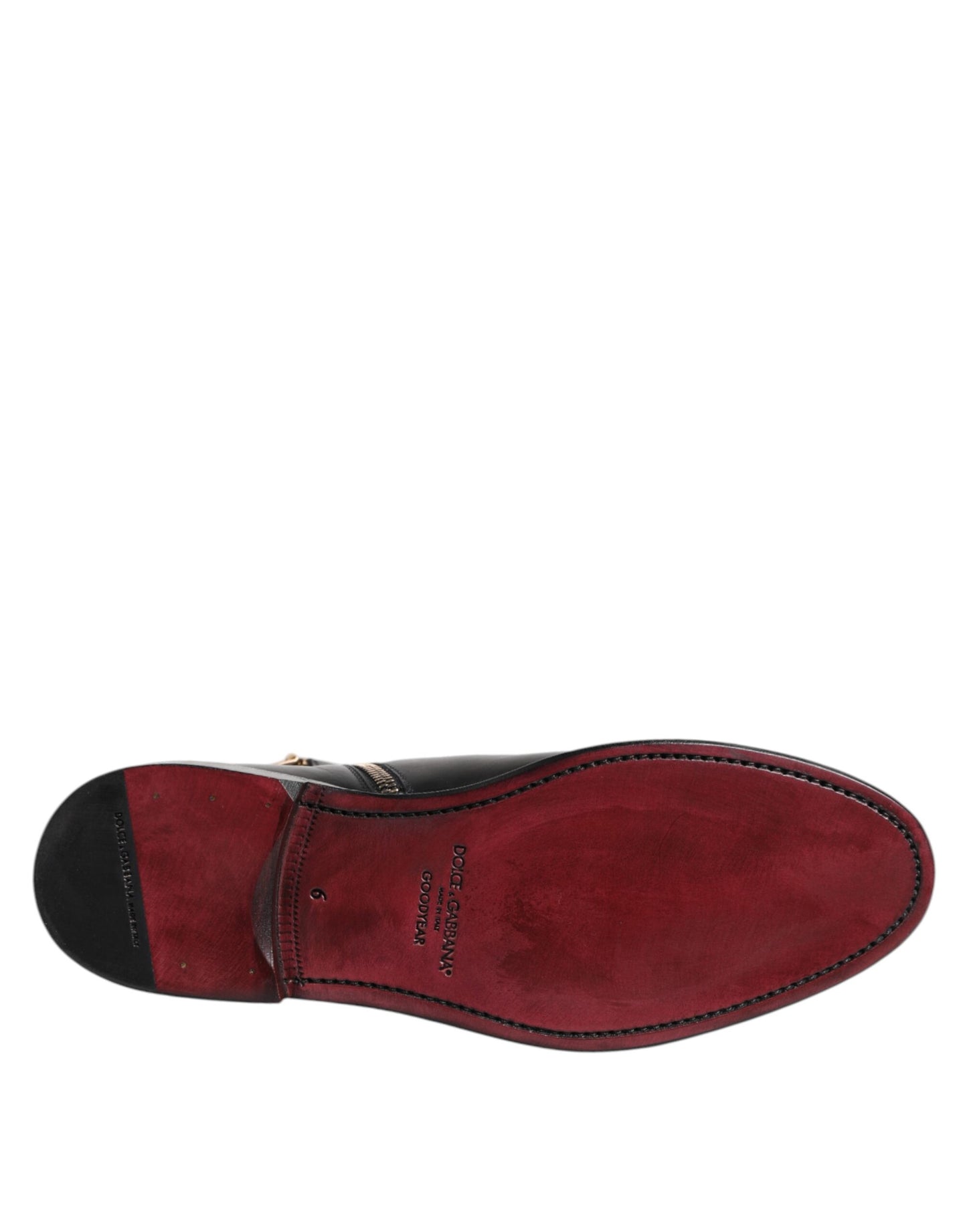 Bottines Chelsea en cuir noir de Dolce & Gabbana, hauteur mi-mollet.