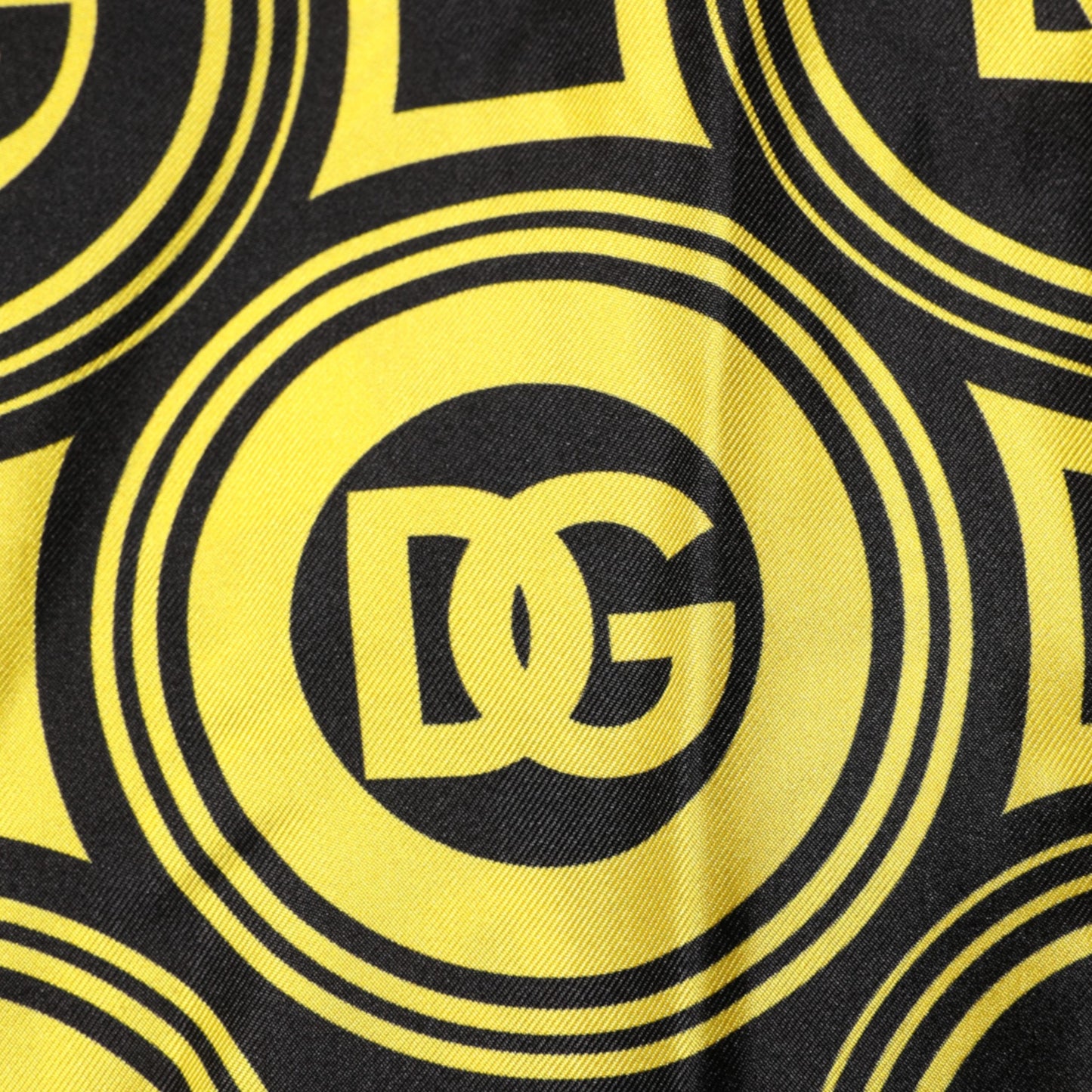 T-shirt en soie jaune avec logo DG géométrique argenté de Dolce & Gabbana