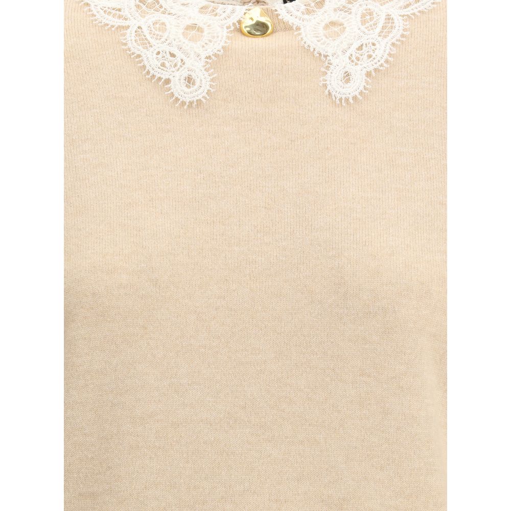 Pull col en dentelle de Fabiana Filippi