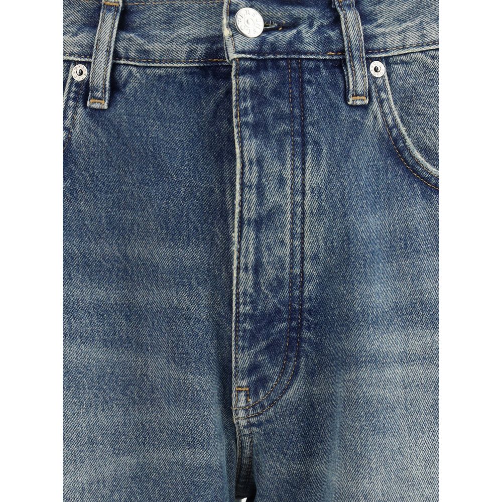Wijdgeknoopte jeans in zonnebloemgeel
