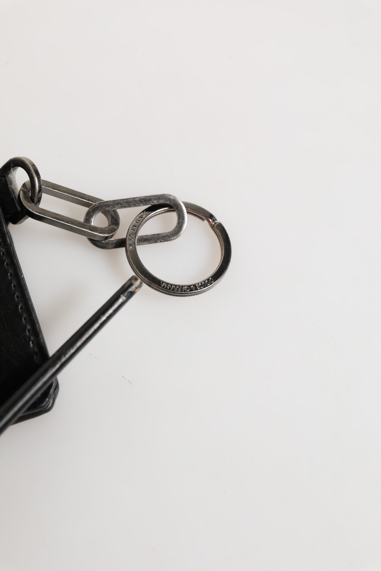 Porte-cartes et porte-clés en cuir noir avec logo en relief de Dolce & Gabbana