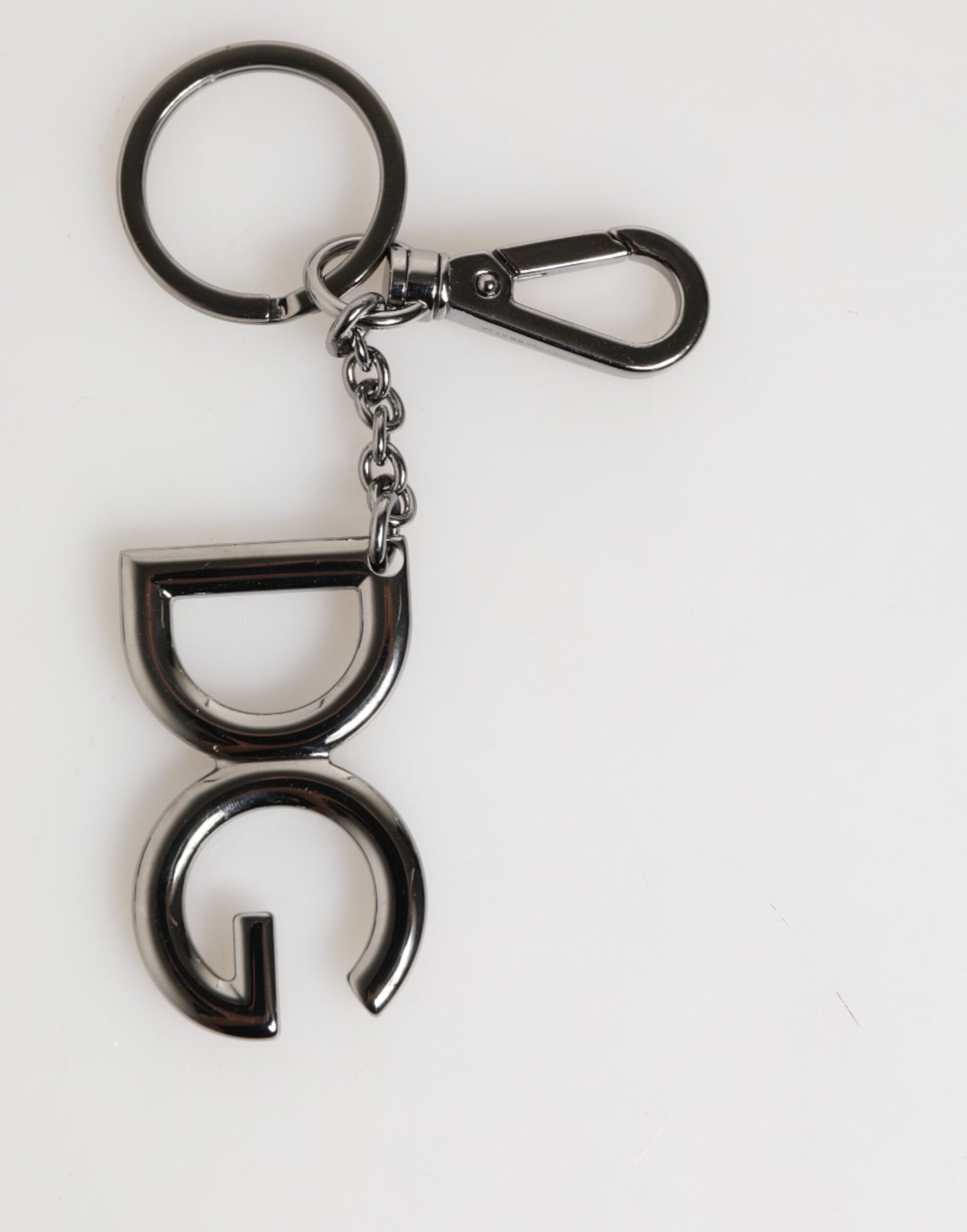 Porte-clés en métal pour homme Dolce & Gabbana, logo DG en laiton argenté.