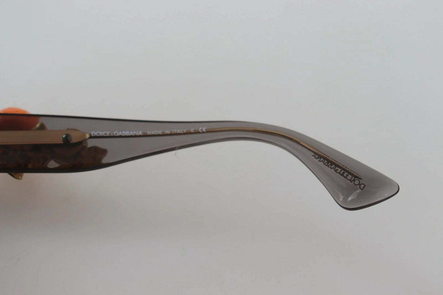 Lunettes de soleil Dolce & Gabbana DG4283B en acétate avec cristaux et appliqués orange.