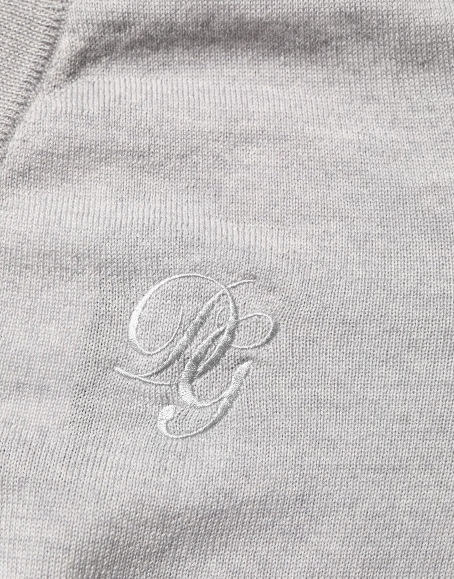 Pull en laine grise à col en V avec logo de Dolce & Gabbana