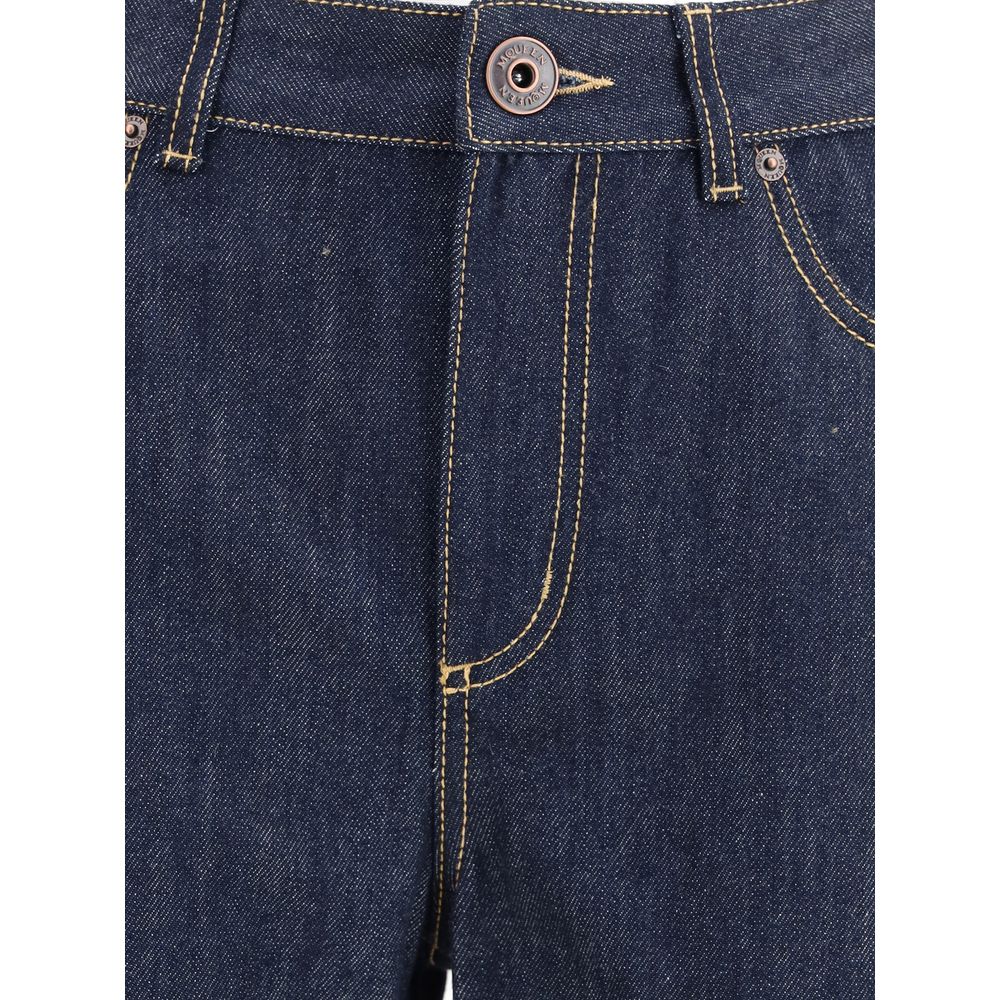 Les jeans en jean Alexander McQueen ont une coupe droite.