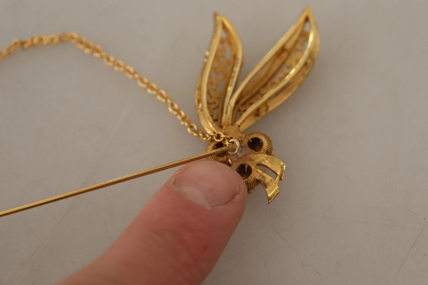 Dolce & Gabbana Broche van 925 sterling zilver met gouden details en kristallen ketting.