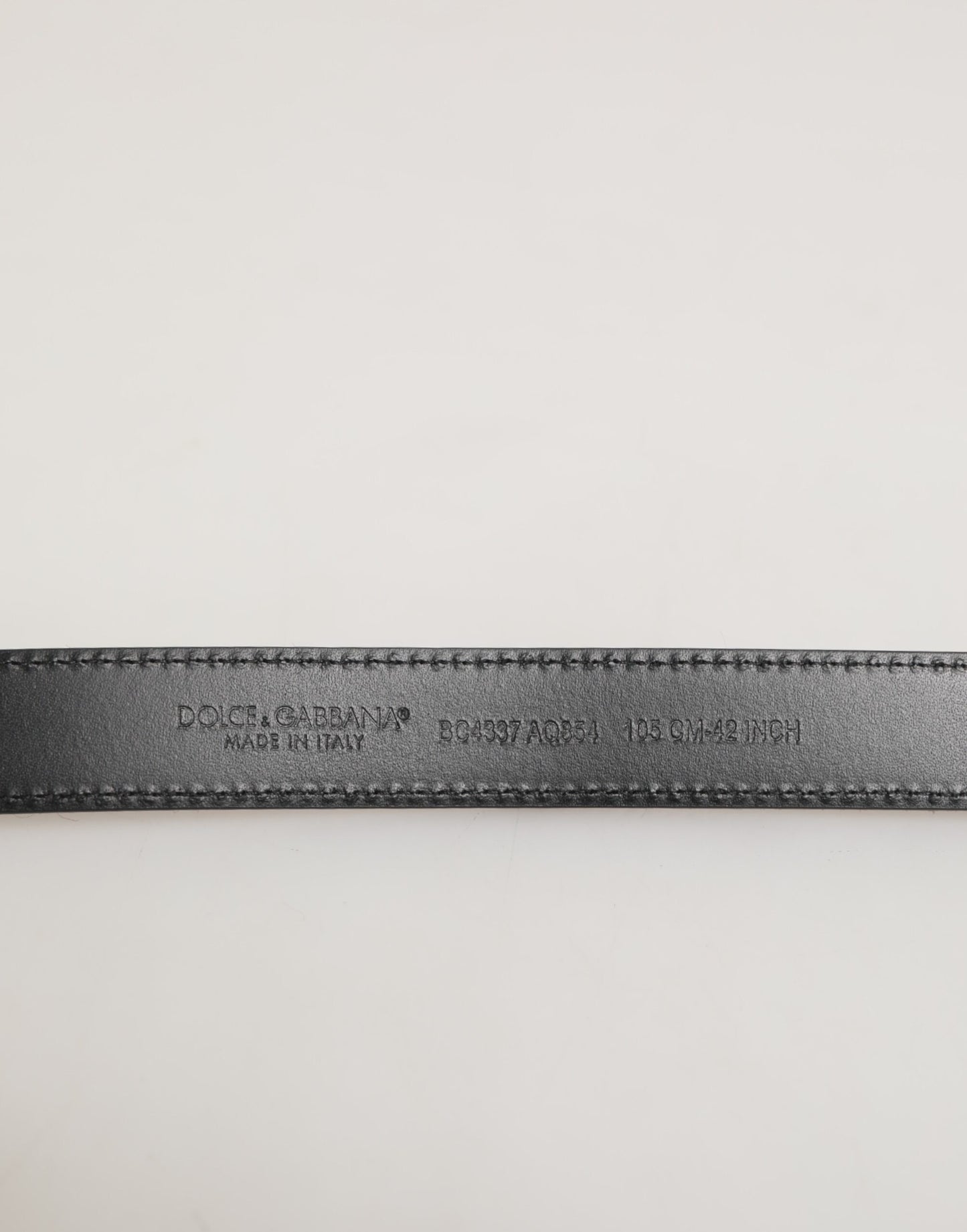 Ceinture homme en cuir de veau avec boucle en métal, rouge et noire, Dolce & Gabbana.