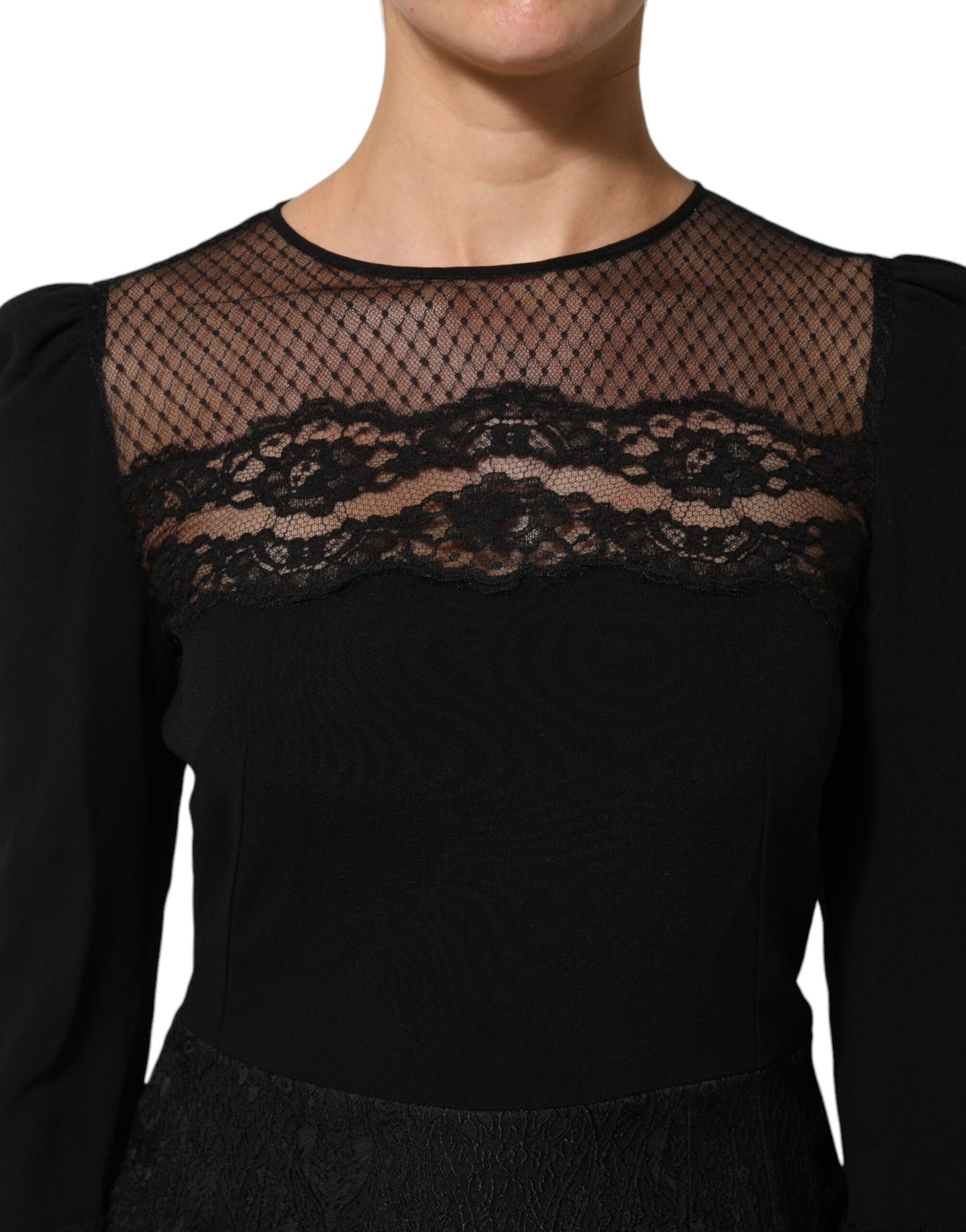 Dolce & Gabbana zwarte, A-lijn jurk met bloemrijke kant en kantrand.
