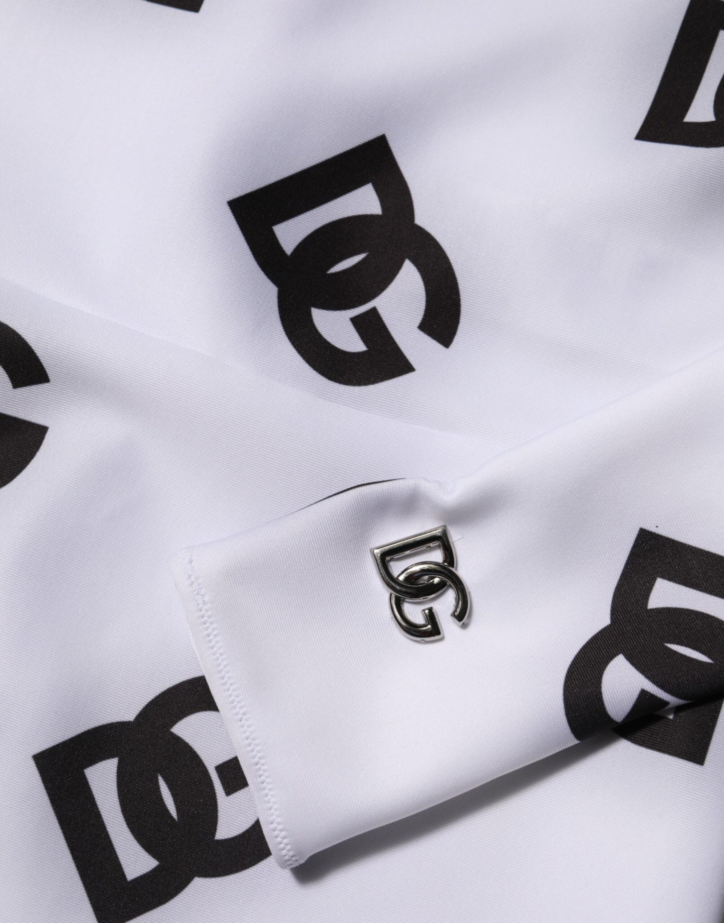 Dolce & Gabbana zwarte en witte jurk met logo en monogram, lange mouwen, in jumpsuit-stijl.