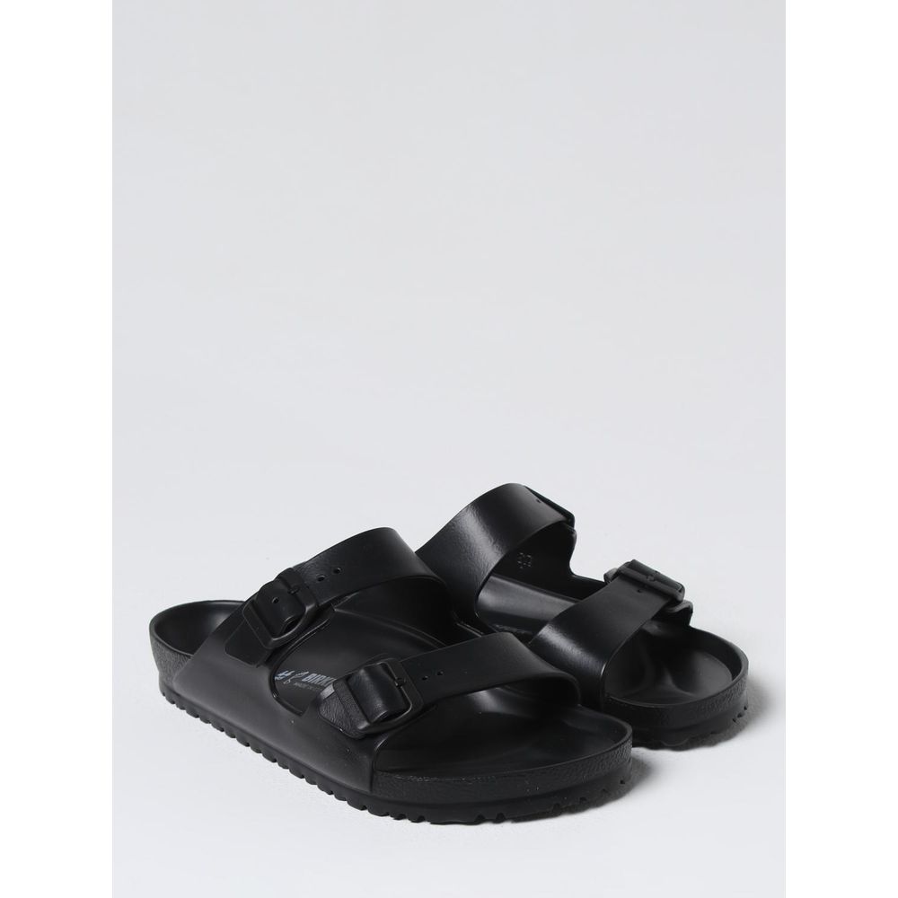 Sandales plates Birkenstock noires en EVA