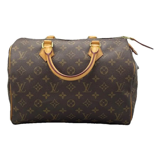 Sac à main d'occasion en cuir Louis Vuitton Speedy - bon état - Chakmar Luxe