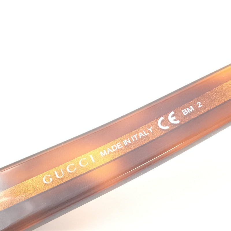 Gucci Cat Eye Sunglasses with Tortoise Shell Design