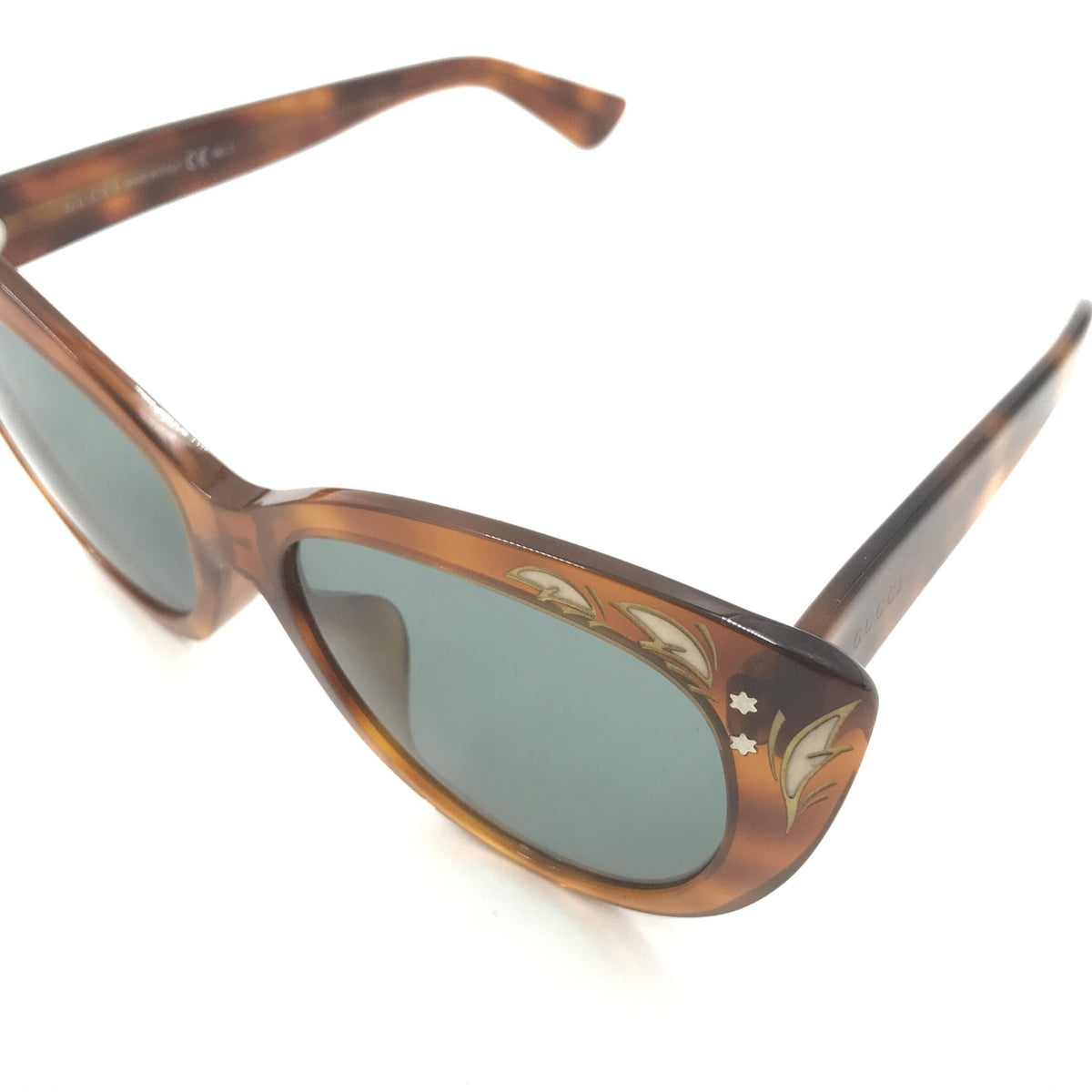 Gucci Cat Eye Sunglasses with Tortoise Shell Design