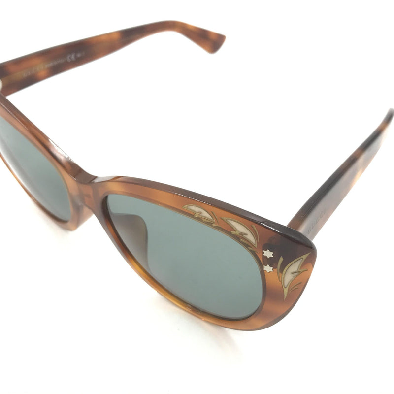 Gucci Cat Eye Sunglasses with Tortoise Shell Design
