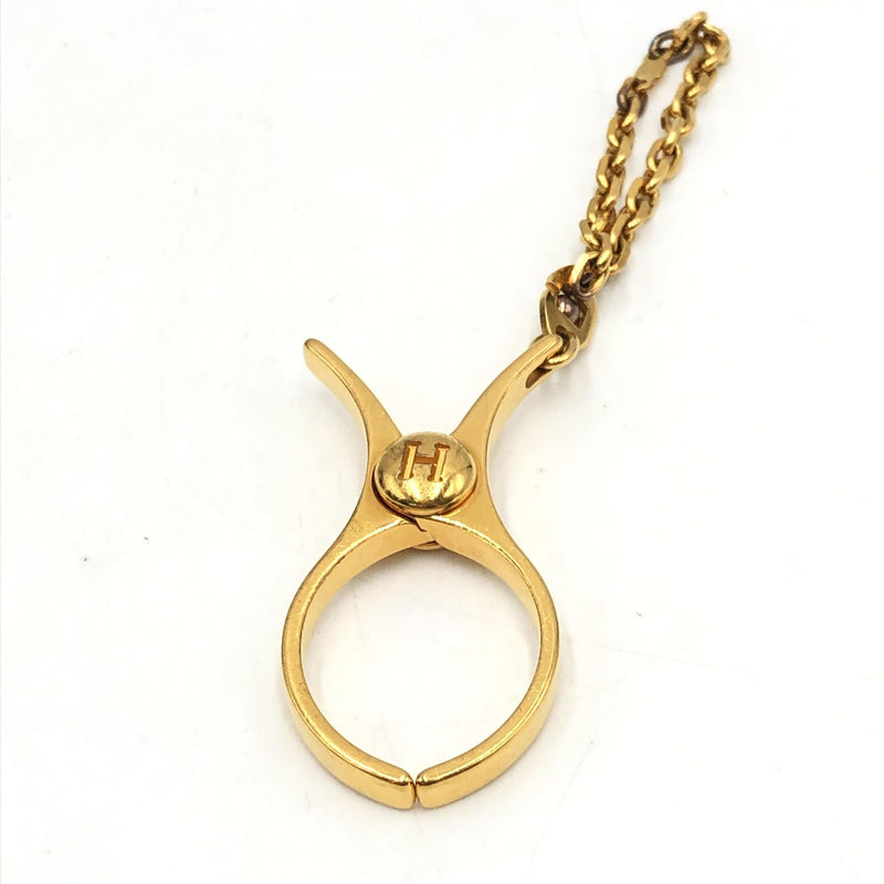 Hermès Gold Metal Glove Holder Keychain - Luxury Accessory