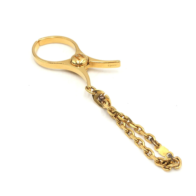 Hermès Gold Metal Glove Holder Keychain - Luxury Accessory