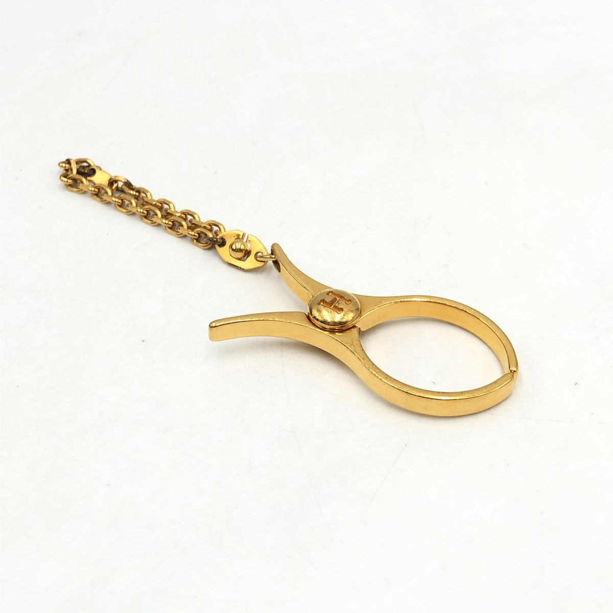 Hermès Gold Metal Glove Holder Keychain - Luxury Accessory