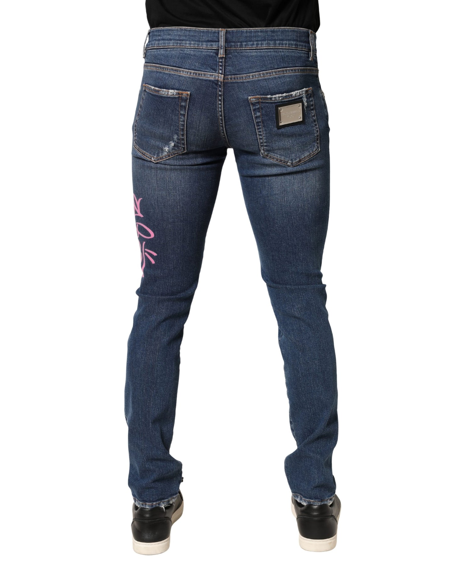 Jean skinny bleu délavé à imprimé graffiti Dolce &amp; Gabbana