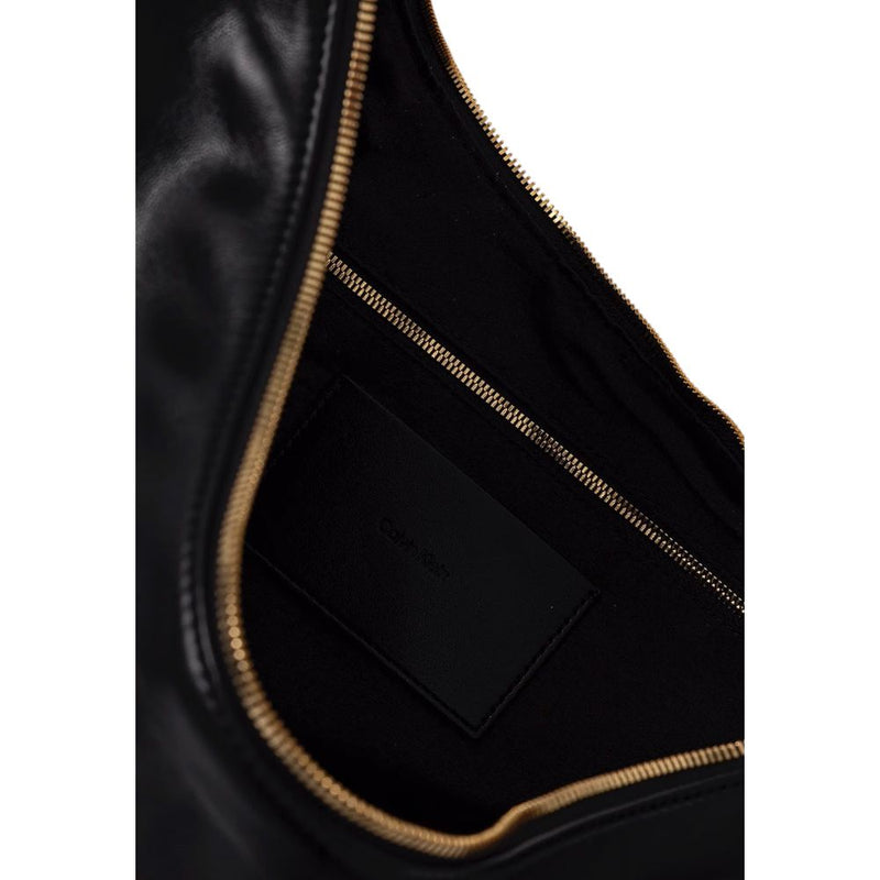 Calvin Klein Pinched Soft Crescent Black Handbag - Élégance et Fonctionnalité