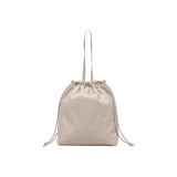 Calvin Klein Drawstring Tote Handbag in Beige Polyurethane