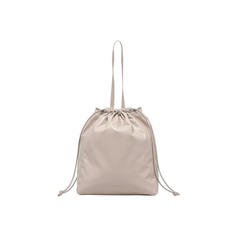 Calvin Klein Drawstring Tote Handbag in Beige Polyurethane