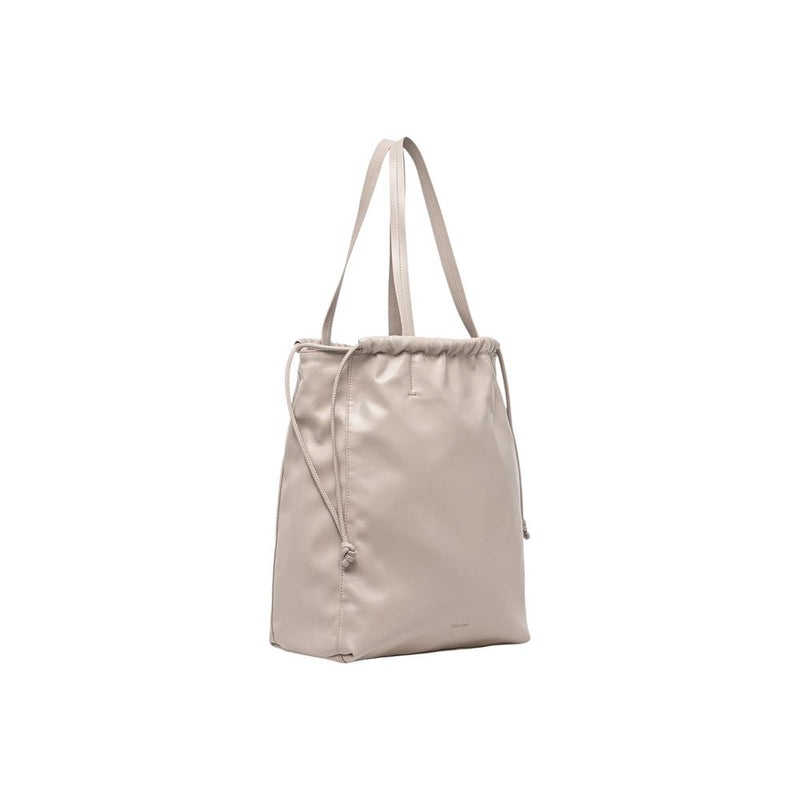 Calvin Klein Drawstring Tote Handbag in Beige Polyurethane