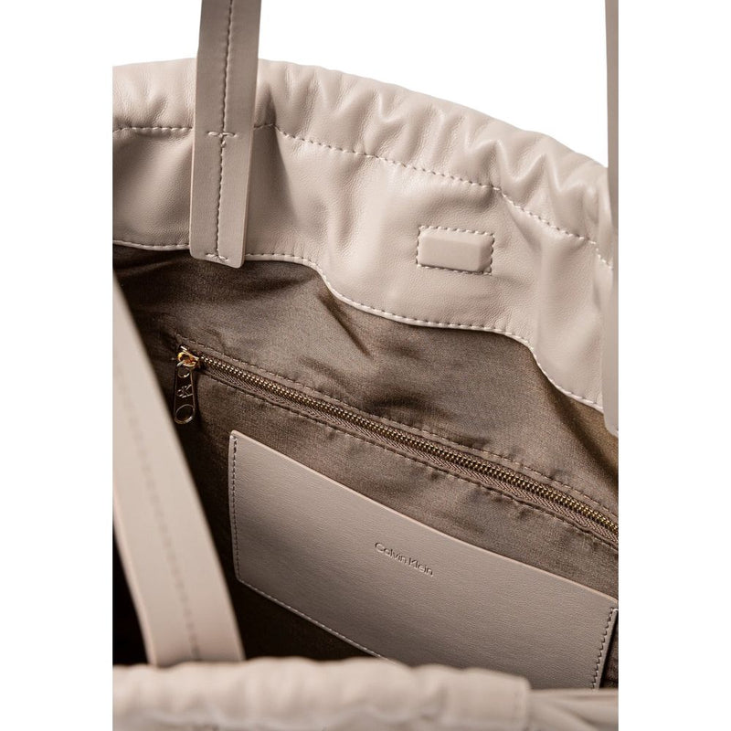 Calvin Klein Drawstring Tote Handbag in Beige Polyurethane