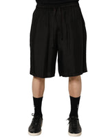 Short Bermuda Dolce & Gabbana en soie noire avec cordon de serrage pour homme