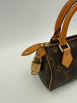 Louis Vuitton Nano Speedy Monogram Handbag - Élégance Intemporelle
