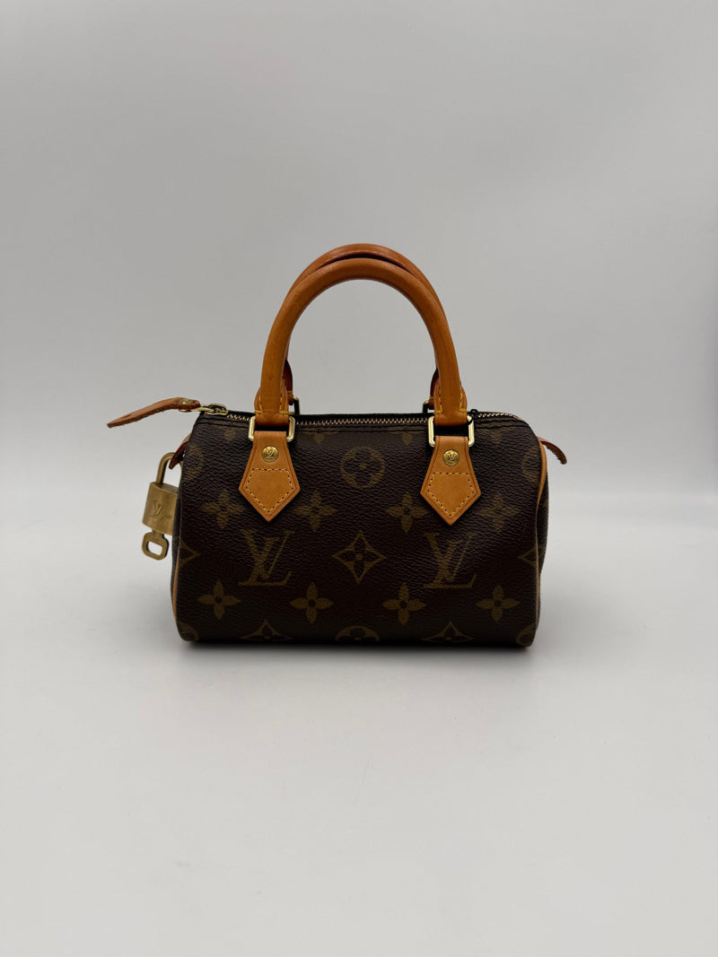 Louis Vuitton Nano Speedy Monogram Handbag - Élégance Intemporelle