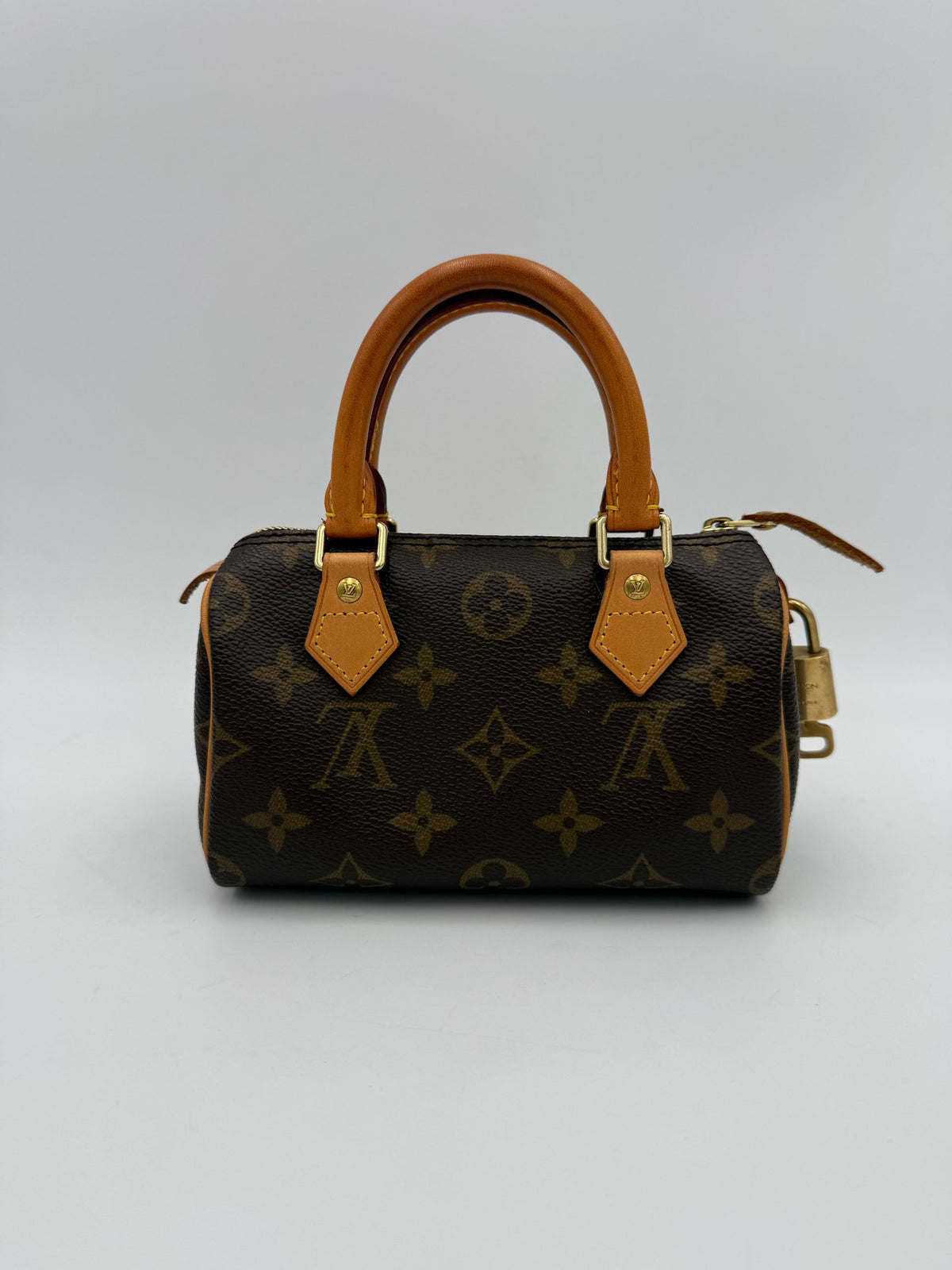 Louis Vuitton Nano Speedy Monogram Handbag - Élégance Intemporelle