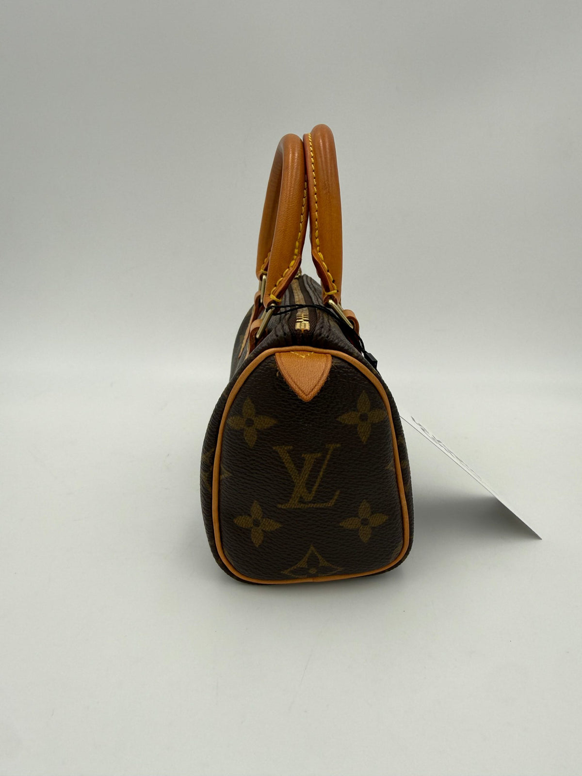 Louis Vuitton Nano Speedy Monogram Handbag - Élégance Intemporelle
