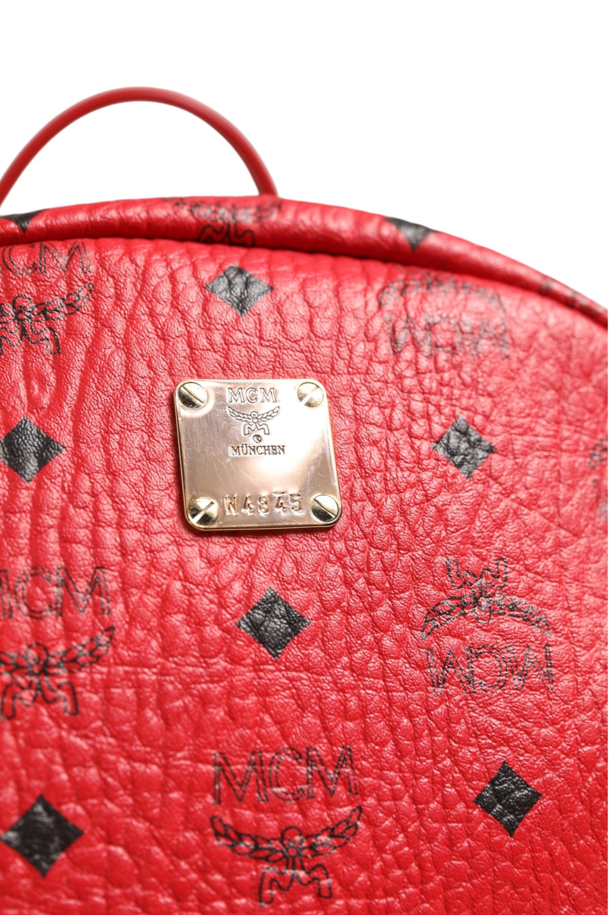MCM Medium Stark Studded Visetos Backpack in Red