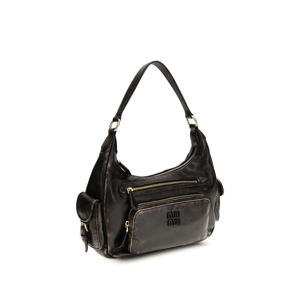 Sac bandoulière Miu Miu Bos Taurus en cuir de veau marron