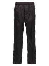 Valentino Garavani Black Polyamide Casual Pants for Men