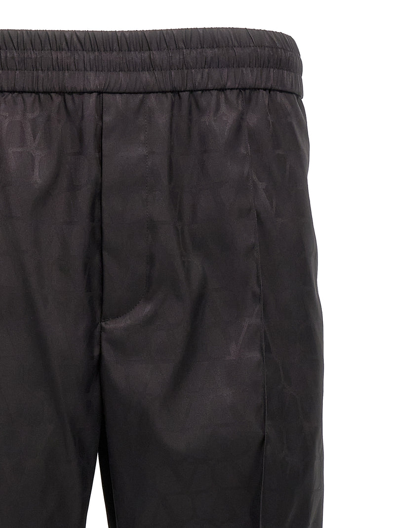 Valentino Garavani Black Polyamide Casual Pants for Men