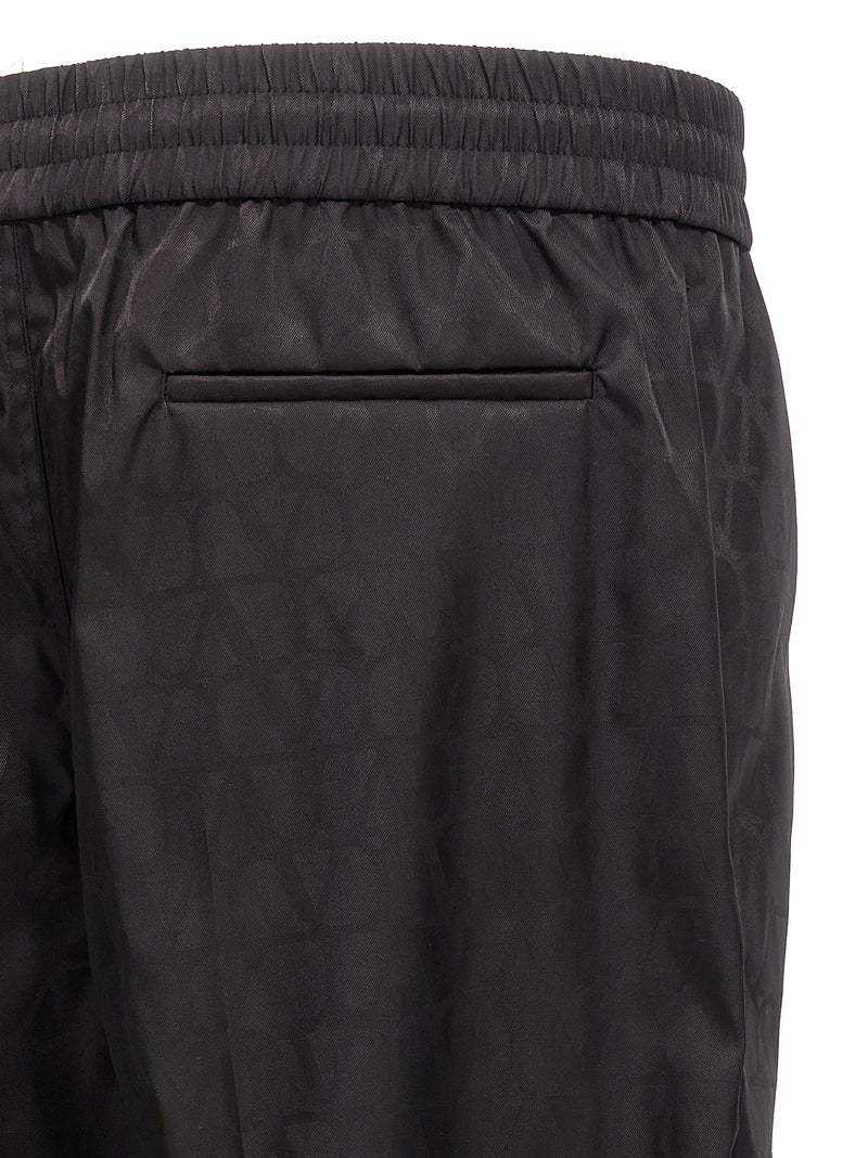 Valentino Garavani Black Polyamide Casual Pants for Men