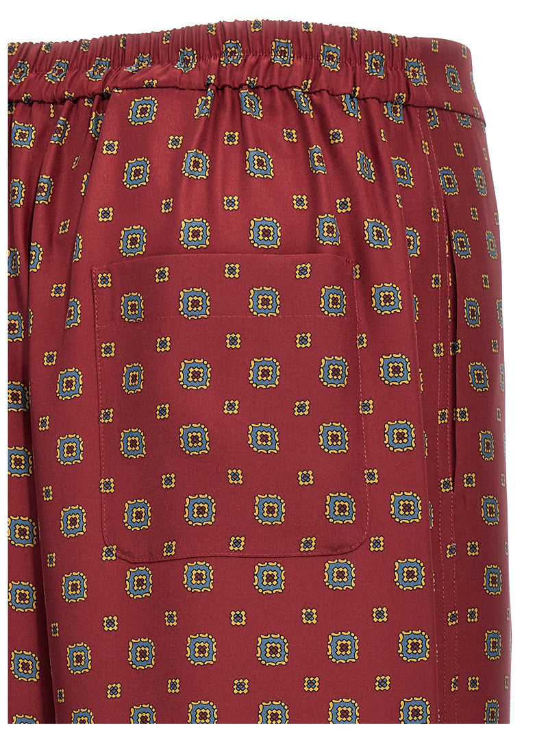 Moschino Bordeaux Silk Casual Pants - Luxurious Comfort and Style