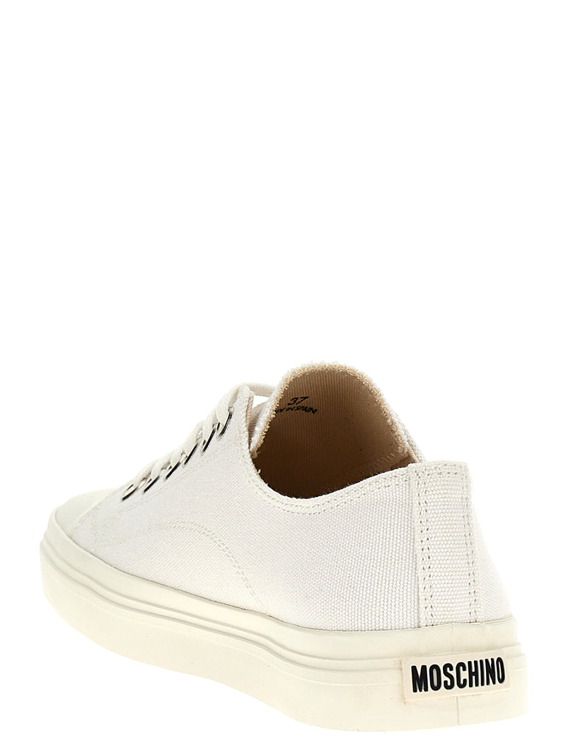 Baskets basses Moschino en coton blanc