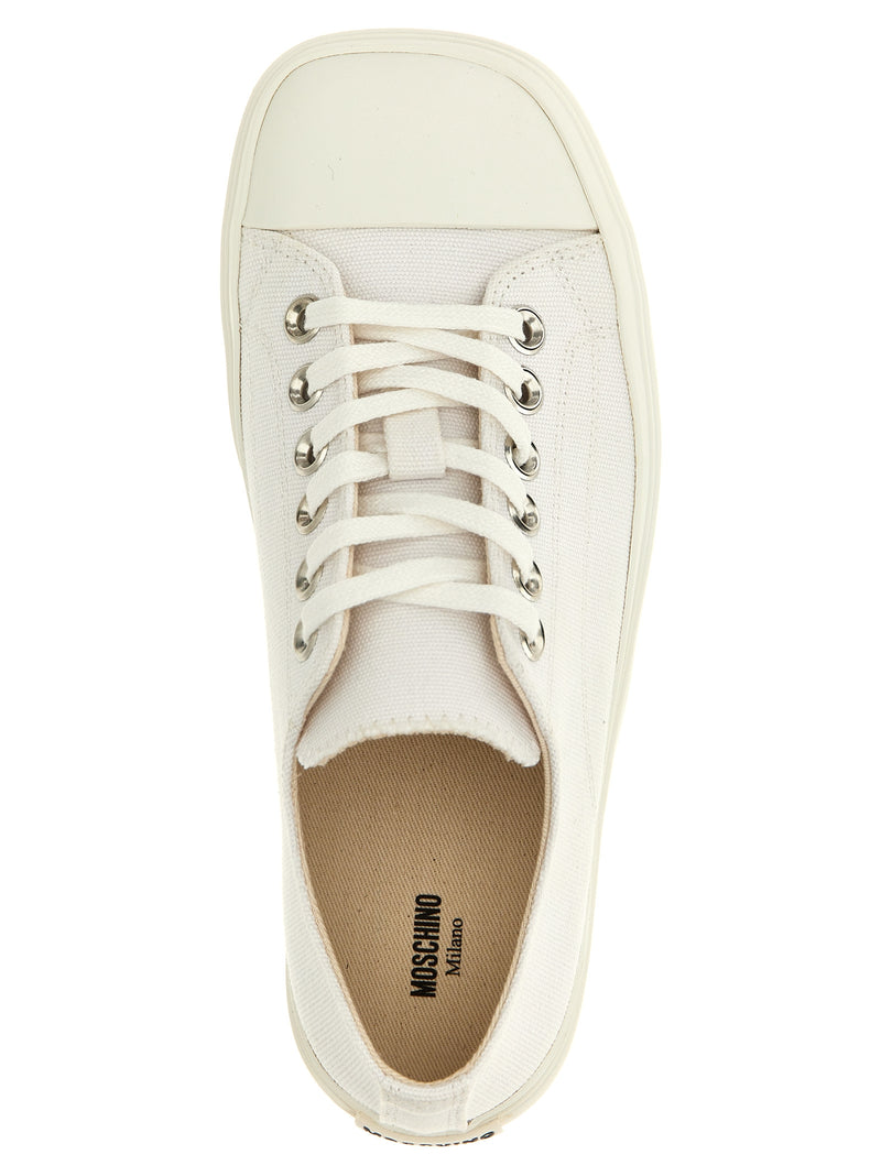 Baskets basses Moschino en coton blanc
