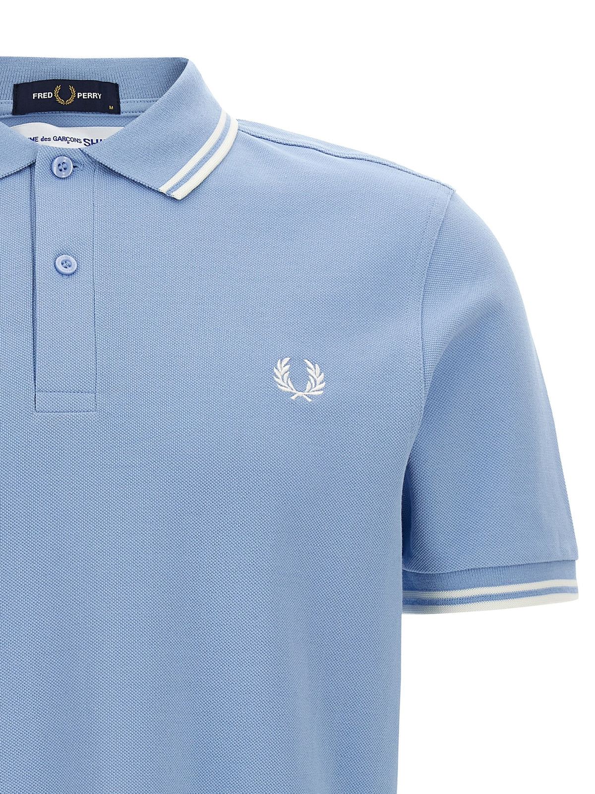 Polo Comme des Garçons en coton bleu