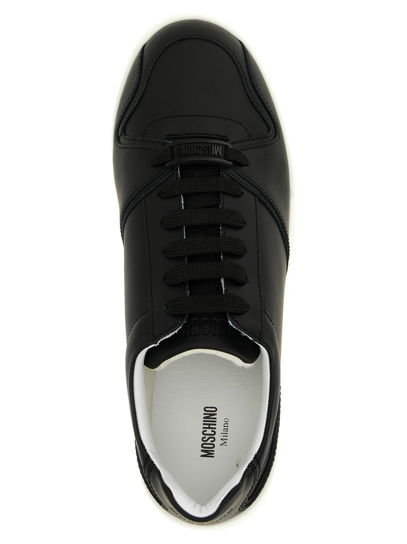 Baskets basses en cuir noir Moschino