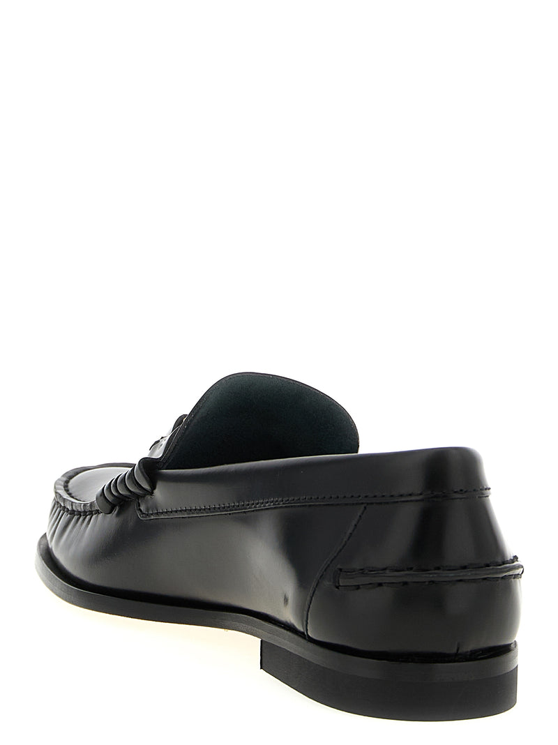 Tod's Black Calfskin Slip-On Loafers - Timeless Elegance