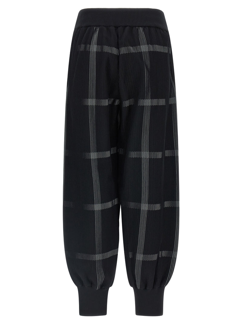 PLEATS PLEASE ISSEY MIYAKE Pantalon décontracté noir en polyester