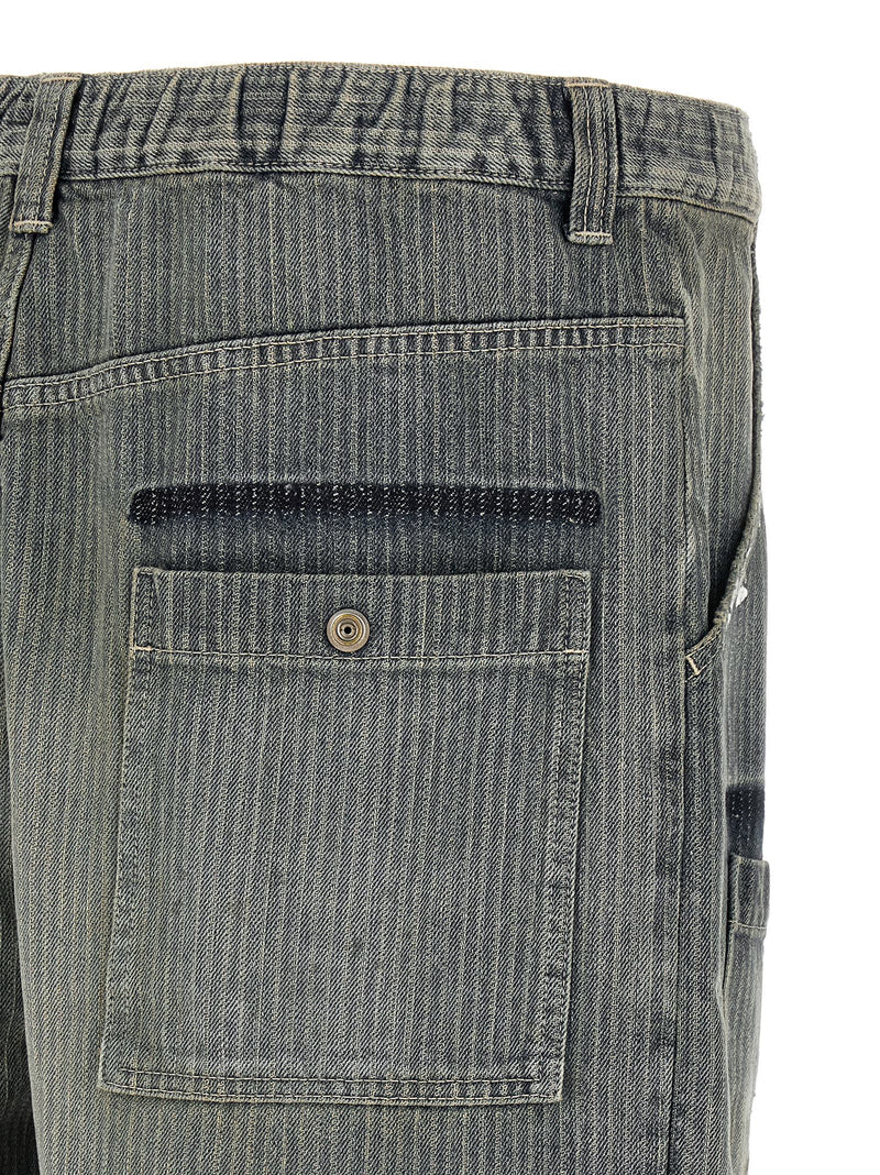 Jean fuselé en coton bleu Maison Mihara Yasuhiro