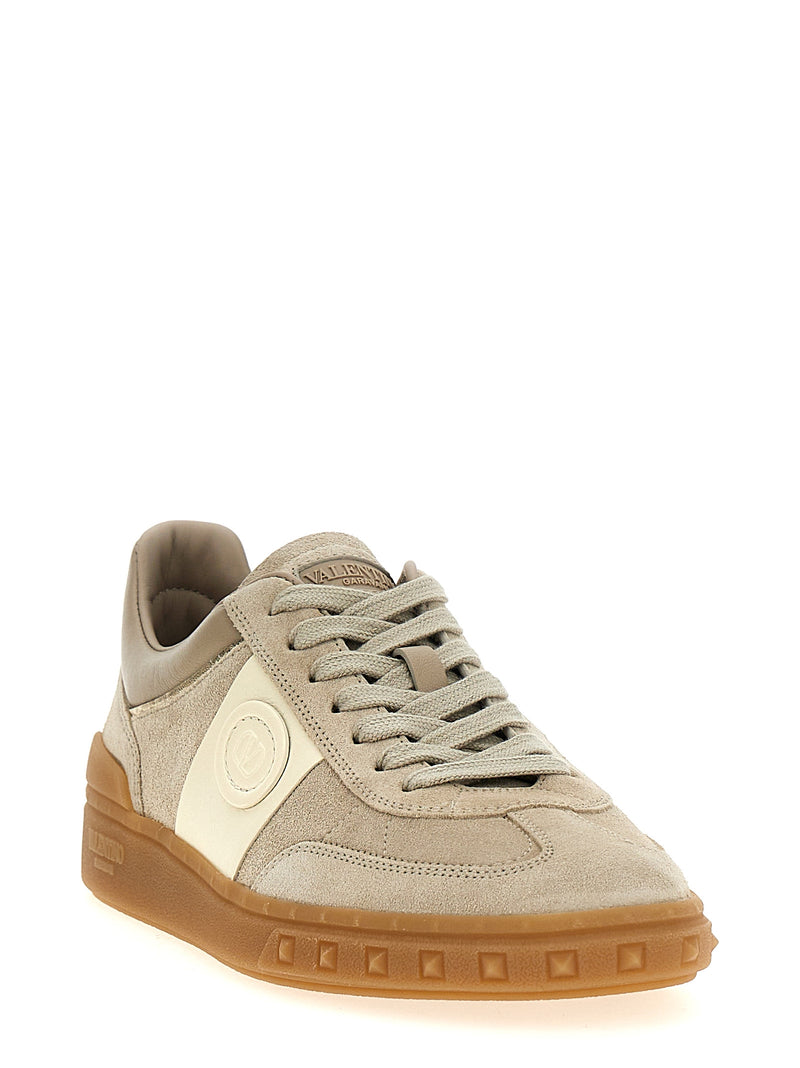 Baskets basses Valentino Garavani en cuir de veau beige