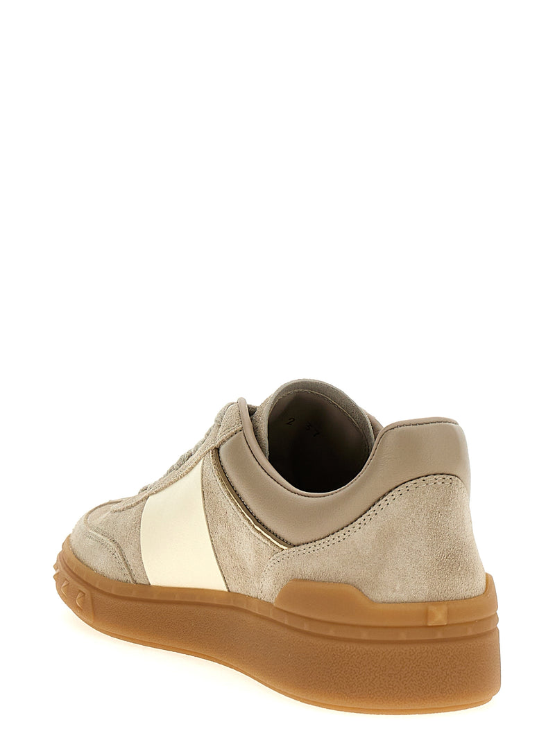 Baskets basses Valentino Garavani en cuir de veau beige