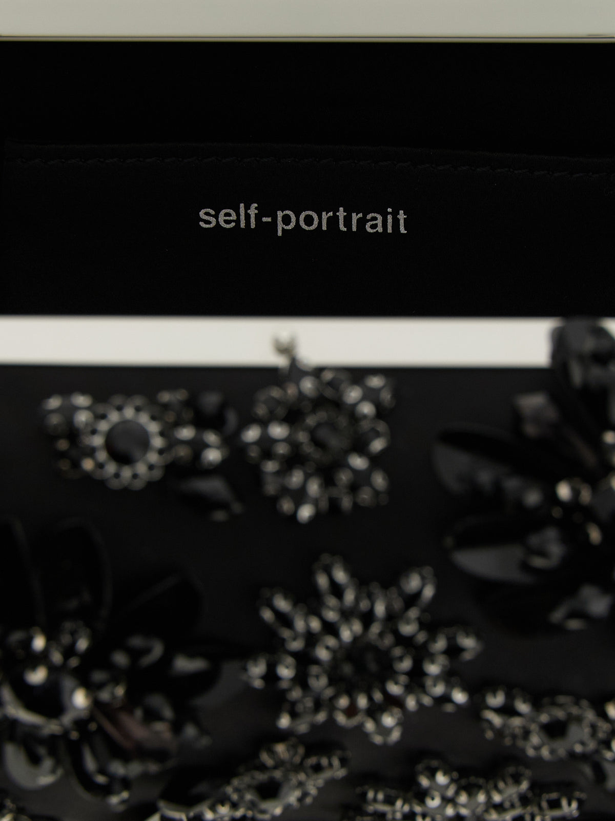 Pochette en polyester noir Self-Portrait