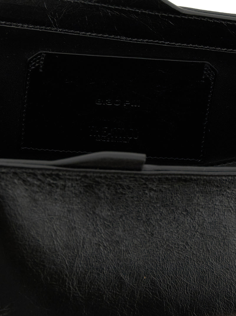 La pochette The Attico en veau noir