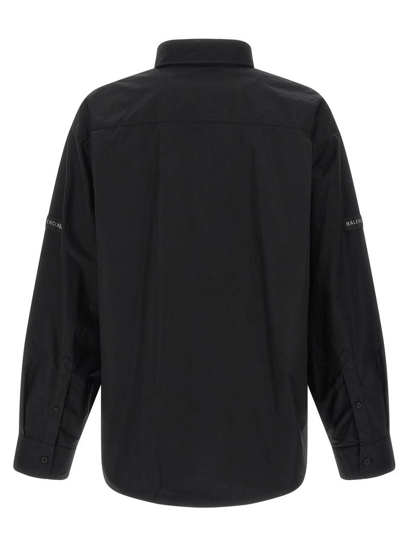 Chemisier Balenciaga en coton noir